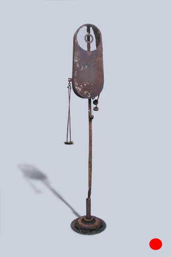 Metal sculpture - metal pole topped with lantern surrounded by metal hoop
